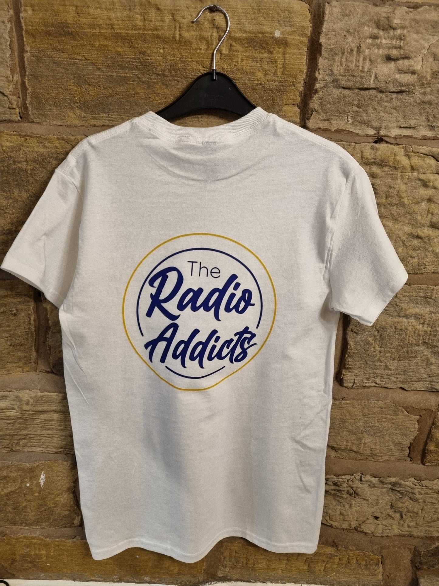 White Tshirt with The Radio Addicts logo printed on the front and back THE ONE DANIEL WEARS (see photos)